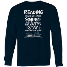 Load image into Gallery viewer, Reading give us someplace to go when we have to stay where we are - Crew Sweatshirt